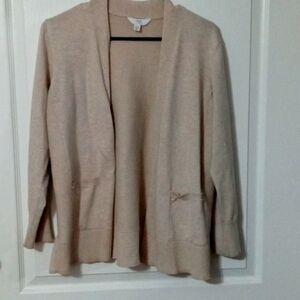 A tan cardigan